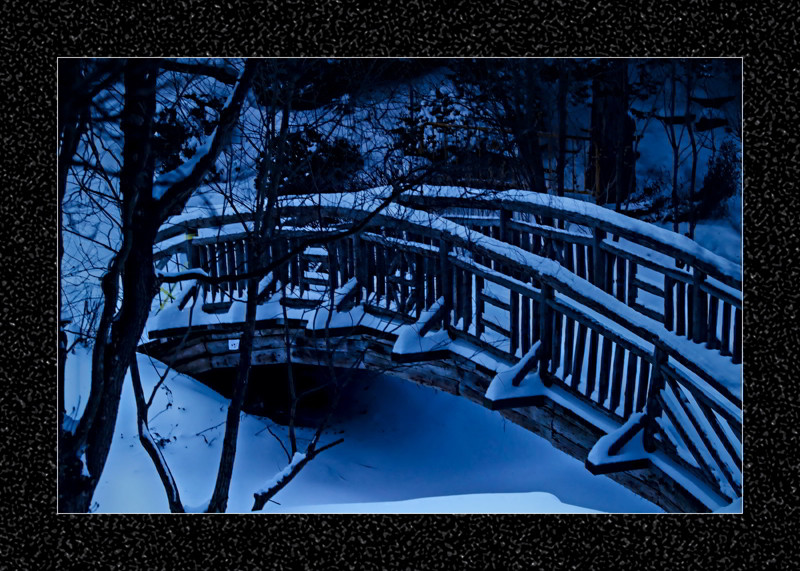 Snow-covered wooden bridge- 00